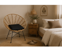 Fauteuil en rotin design rond avec coussin et pieds métal | MELTO